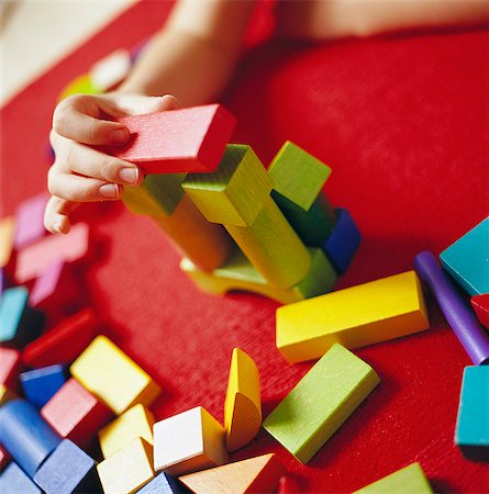 Child playing with building bricks, Sweden. Stock Photo - Premium Royalty-Free, Code: 6102-03750747