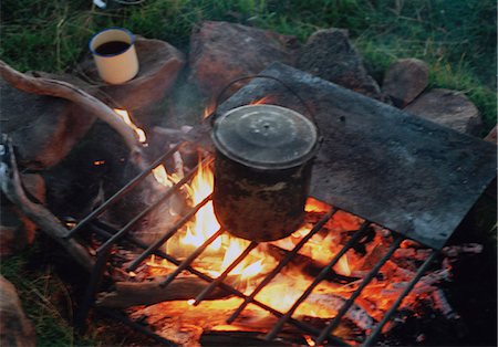 summer camping fire - Cooking  food on a fire. Stock Photo - Premium Royalty-Free, Code: 6102-03751170