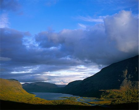 fantastically - Lake surrounded by mountains Stock Photo - Premium Royalty-Free, Code: 6102-03858960