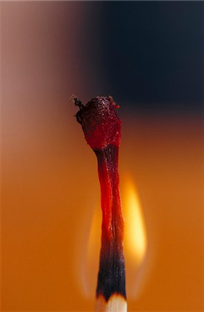 Close-up of flaming match stick Stock Photo - Premium Royalty-Free, Code: 6102-03859111