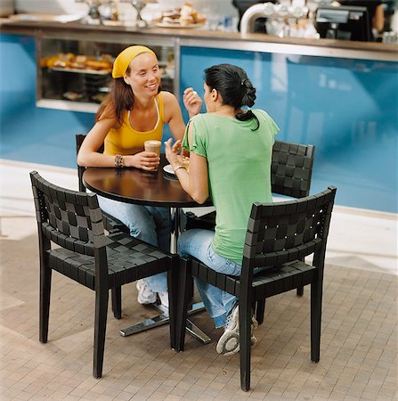 Two women having coffee in cafe Stock Photo - Premium Royalty-Free, Code: 6102-03859271