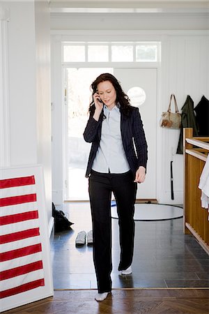 simsearch:6102-07455789,k - A woman talking in the phone, Sweden. Stock Photo - Premium Royalty-Free, Code: 6102-03865843