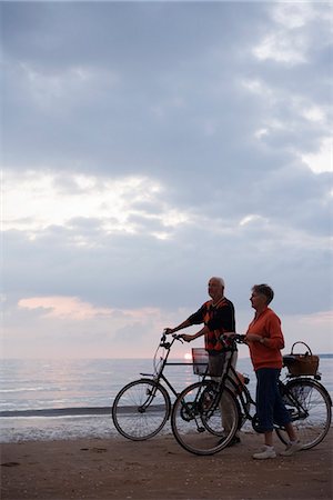 An elderly couple with bicycles, Skane, Sweden. Stock Photo - Premium Royalty-Free, Code: 6102-03866527