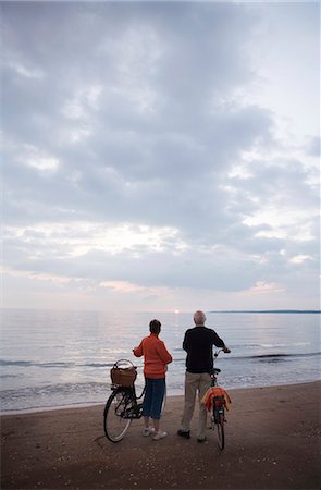 An elderly couple with bicycles, Skane, Sweden. Stock Photo - Premium Royalty-Free, Code: 6102-03866528