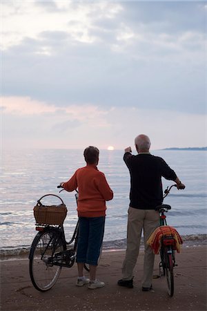 An elderly couple with bicycles, Skane, Sweden. Stock Photo - Premium Royalty-Free, Code: 6102-03866529