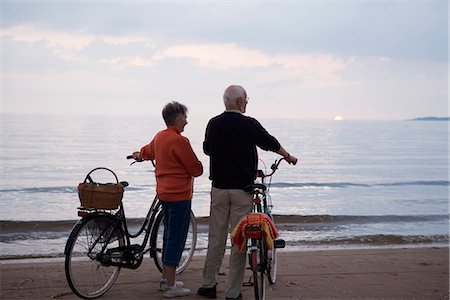 An elderly couple with bicycles, Skane, Sweden. Stock Photo - Premium Royalty-Free, Code: 6102-03866530