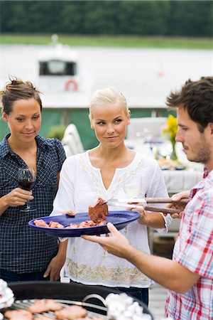 simsearch:6109-06781569,k - Friends having a barbeque, Sweden. Stock Photo - Premium Royalty-Free, Code: 6102-03866705