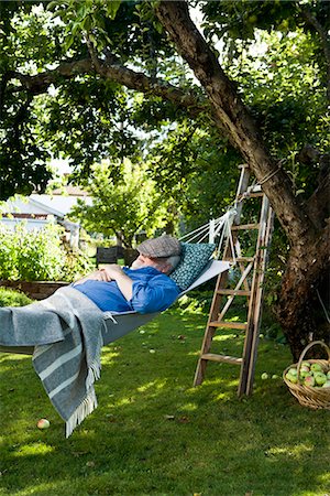 An old man in a hammock, Sweden. Stock Photo - Premium Royalty-Free, Code: 6102-03866948