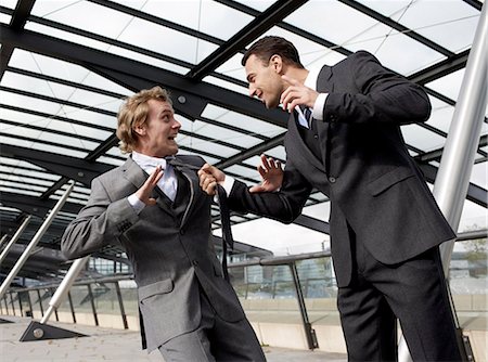 Two businessmen on the airport, Denmark. Stock Photo - Premium Royalty-Free, Code: 6102-03867213