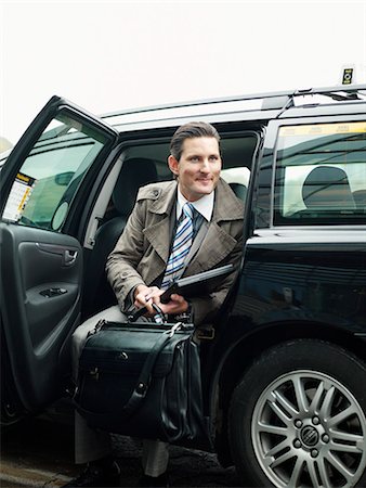 simsearch:6102-07455789,k - Businessman in a taxi, Sweden. Stock Photo - Premium Royalty-Free, Code: 6102-03867351