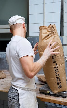 sack - A baker in a bakery, Sweden. Stock Photo - Premium Royalty-Free, Code: 6102-03867381