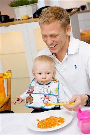 A father feeding his baby, Sweden. Stock Photo - Premium Royalty-Free, Code: 6102-03867778