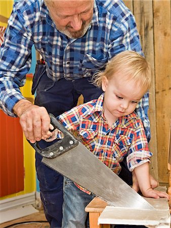 simsearch:6102-07158067,k - A senior man doing carpentry with his grandchild, Sweden. Stock Photo - Premium Royalty-Free, Code: 6102-03826966