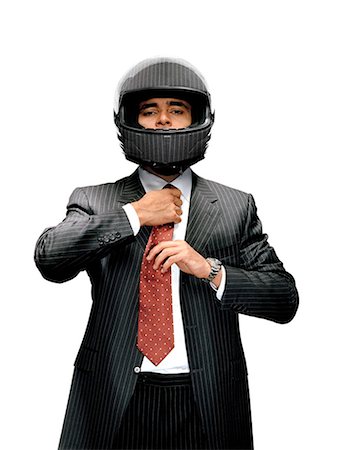 A man wearing a striped suit and a striped helmet, Sweden. Stock Photo - Premium Royalty-Free, Code: 6102-03826935