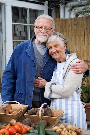 An elderly scandinavian couple with vegetables in front of them, Sweden. Stock Photo - Premium Royalty-Free, Code: 6102-03827034