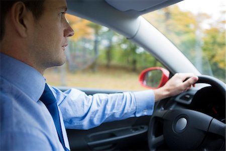 simsearch:632-03403433,k - A man driving a car, Sweden. Stock Photo - Premium Royalty-Free, Code: 6102-03827540