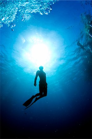 free diving - A diver in blue water, Egypt. Stock Photo - Premium Royalty-Free, Code: 6102-03827930