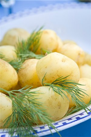 deli - Swedish new potatoes on a plate, Sweden. Stock Photo - Premium Royalty-Free, Code: 6102-03828367