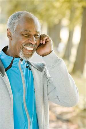 Senior man using a mobile phone, Sweden. Stock Photo - Premium Royalty-Free, Code: 6102-03828581