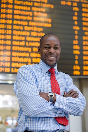 station sign - A businessman at a train station, Stockholm, Sweden. Stock Photo - Premium Royalty-Free, Code: 6102-03828663