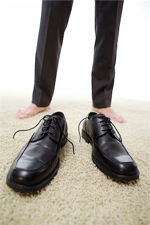 empty shoes - A man and empty shoes. Stock Photo - Premium Royalty-Free, Code: 6102-03828768