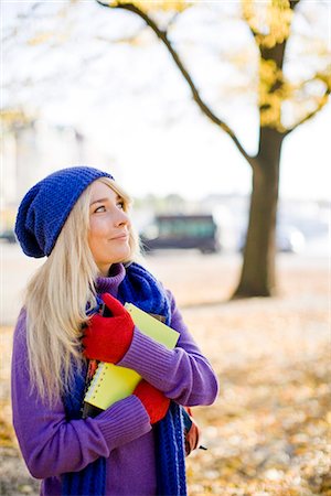 simsearch:6102-06025962,k - A female student in autumn, Sweden. Stock Photo - Premium Royalty-Free, Code: 6102-03828970