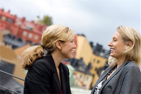 Two women having a conversation, Sweden. Stock Photo - Premium Royalty-Free, Code: 6102-03903923