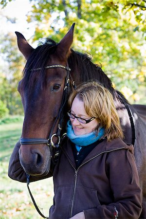 Scandinavian woman with a horse, Sweden. Stock Photo - Premium Royalty-Free, Code: 6102-03904024