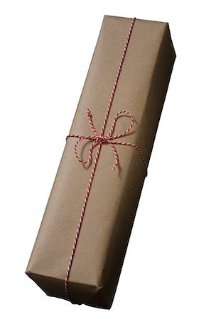 present wrapped close up - A wrapped gift against a white background. Stock Photo - Premium Royalty-Free, Code: 6102-03904157