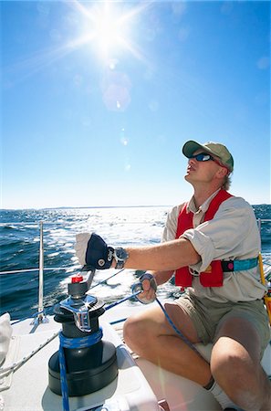 Man on a sailing-boat at sea, the Baltic Sea. Stock Photo - Premium Royalty-Free, Code: 6102-03904166