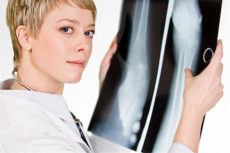 A female doctor holding an X-ray plate, Sweden. Stock Photo - Premium Royalty-Free, Code: 6102-03904259