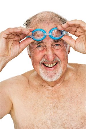 Portrait of a senior man with diving-goggles. Stock Photo - Premium Royalty-Free, Code: 6102-03904870