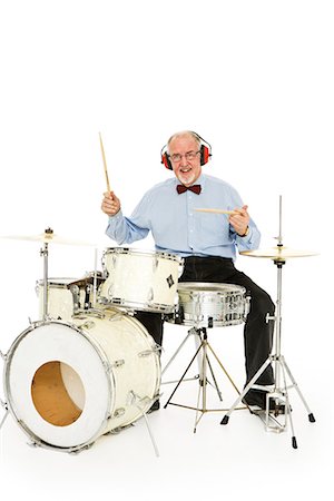 drum (instrument) - Senior man playing the drums. Stock Photo - Premium Royalty-Free, Code: 6102-03904878