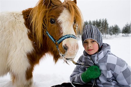 pony human - Boy with a horse, Sweden. Stock Photo - Premium Royalty-Free, Code: 6102-03905102