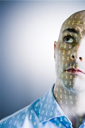 face to internet technology - Gros plan d'un homme avec un nombre numérique reflète sur son visage. Photographie de stock - Premium Libres de Droits, Code: 6102-03905396