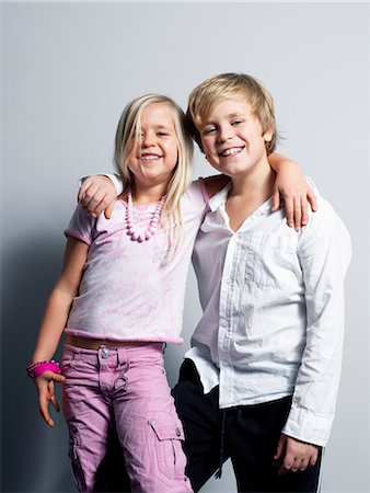 Brother and sister messing about Stock Photo - Premium Royalty-Free, Code: 6102-03905904