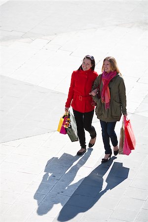 simsearch:6102-06025962,k - Pair of young women shopping Stock Photo - Premium Royalty-Free, Code: 6102-04929534