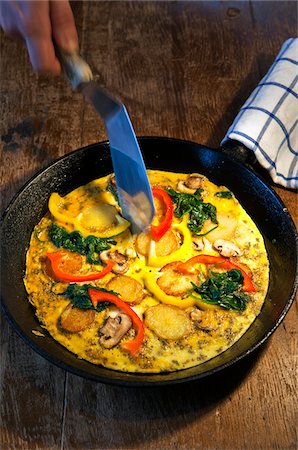 Vegetable omelet on pan Stock Photo - Premium Royalty-Free, Code: 6102-04929830