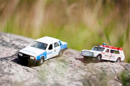 safety and officers - Toy police car and ambulance Stock Photo - Premium Royalty-Free, Code: 6102-05655356