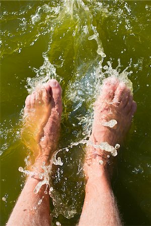 Feet in the water. Stock Photo - Premium Royalty-Free, Code: 6102-05955813