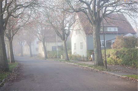 deserted city streets - Morning haze in residential district Stock Photo - Premium Royalty-Free, Code: 6102-06336573