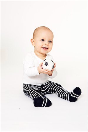 small child - Studio portrait of baby boy Stock Photo - Premium Royalty-Free, Code: 6102-06336597