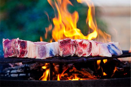 forked - Meat on barbecue grill Stock Photo - Premium Royalty-Free, Code: 6102-06336844