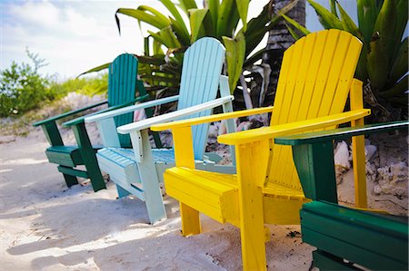 Colored wooden chair on beach Stock Photo - Premium Royalty-Free, Code: 6102-06337128