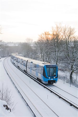 Subway on a snowy railway, Stockholm, Sweden. Stock Photo - Premium Royalty-Free, Code: 6102-06470389