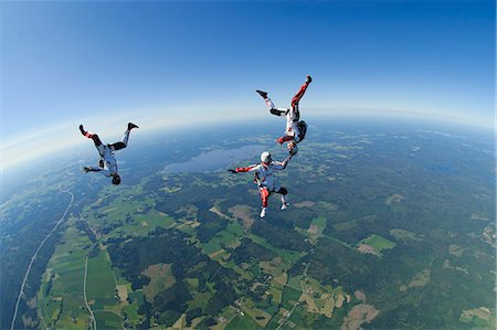 Parachute jumpers in the sky, Sweden. Stock Photo - Premium Royalty-Free, Code: 6102-06470615