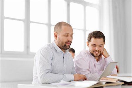 Students studying in library Stock Photo - Premium Royalty-Free, Code: 6102-06471136