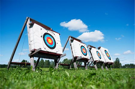 Archery targets on meadow Stock Photo - Premium Royalty-Free, Code: 6102-06777661