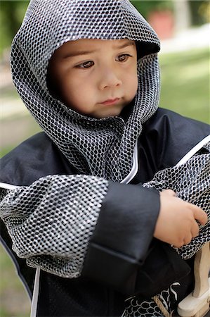 security costume - Boy wearing coat of mail Stock Photo - Premium Royalty-Free, Code: 6102-06965587