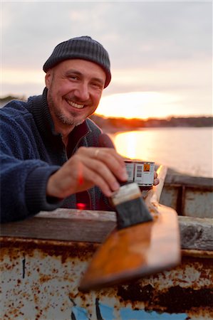 scandinavian ethnicity (male) - Man painting oar Stock Photo - Premium Royalty-Free, Code: 6102-06965527